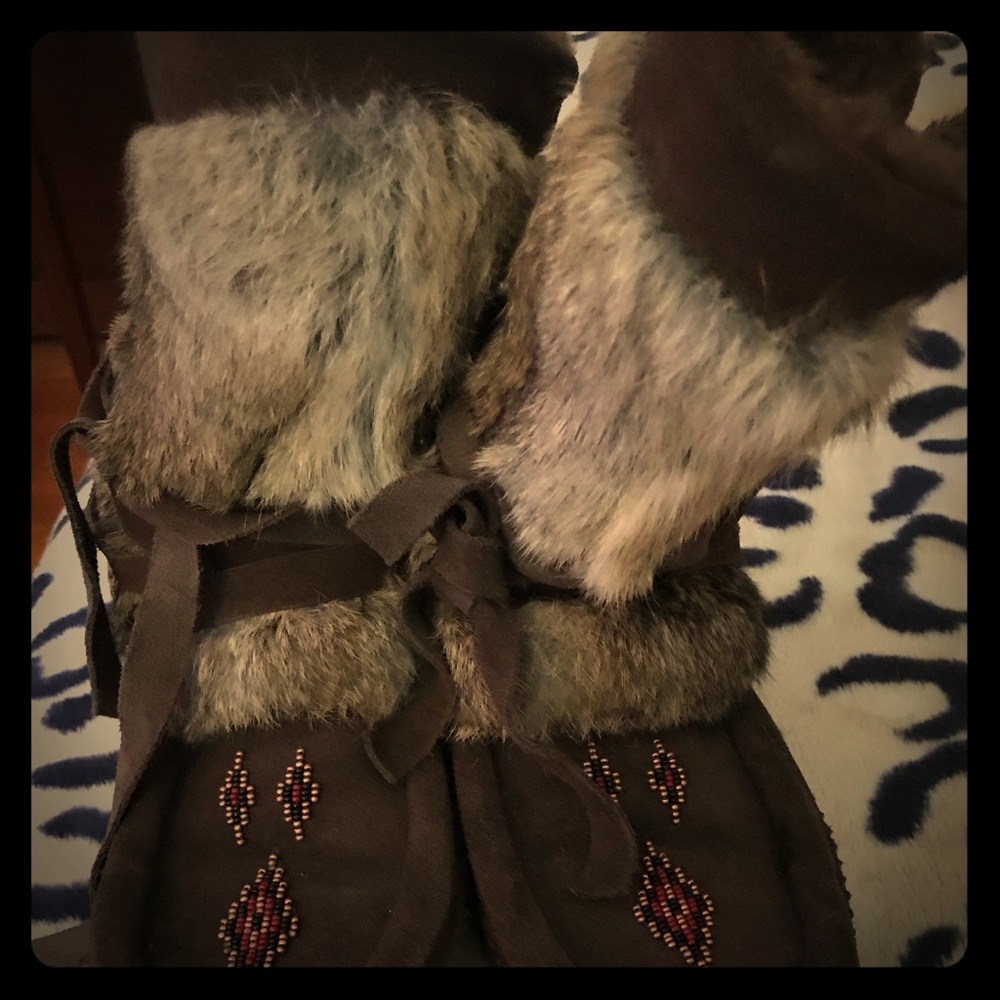 Boots. Would suit a preteen or young teen best